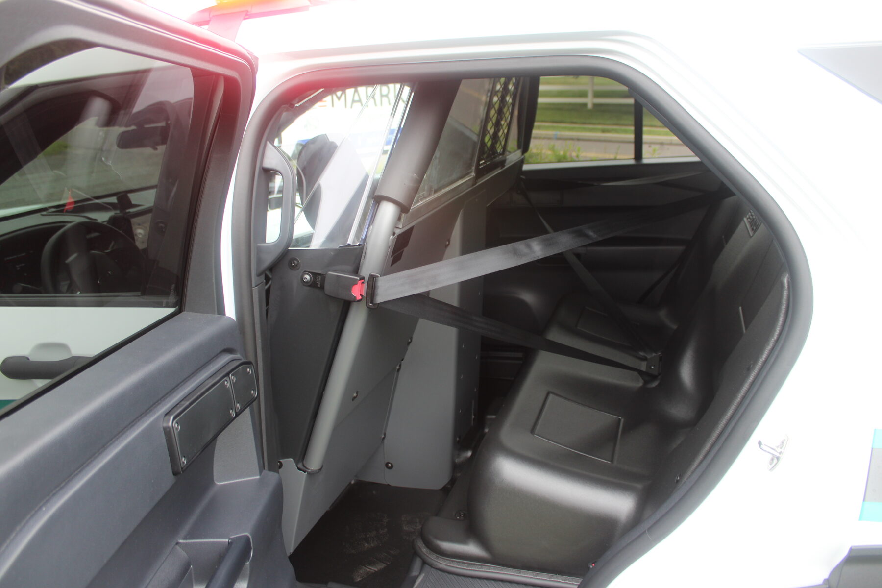 Rear transport seat and partition