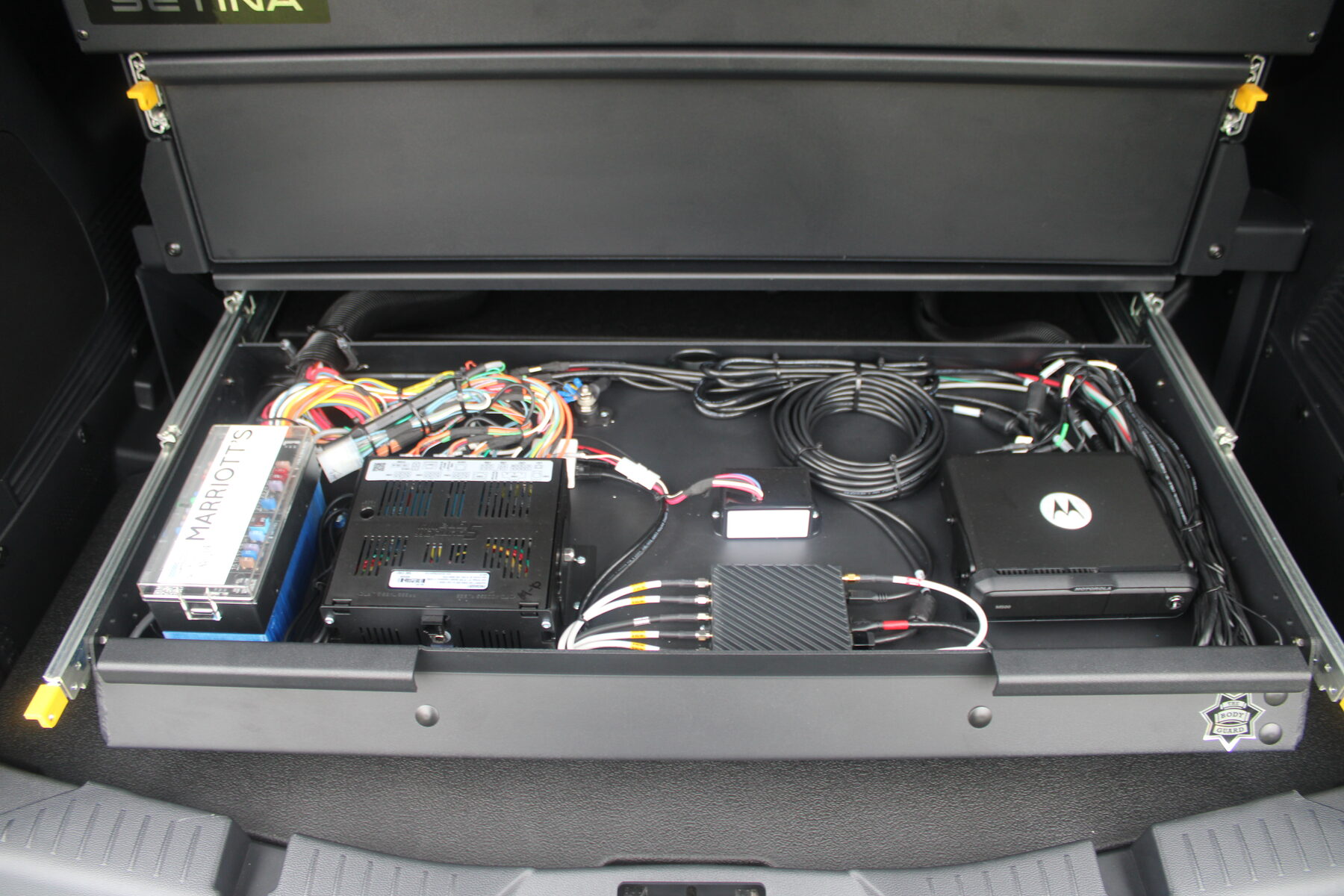 Setina cargo drawer electronics tray
