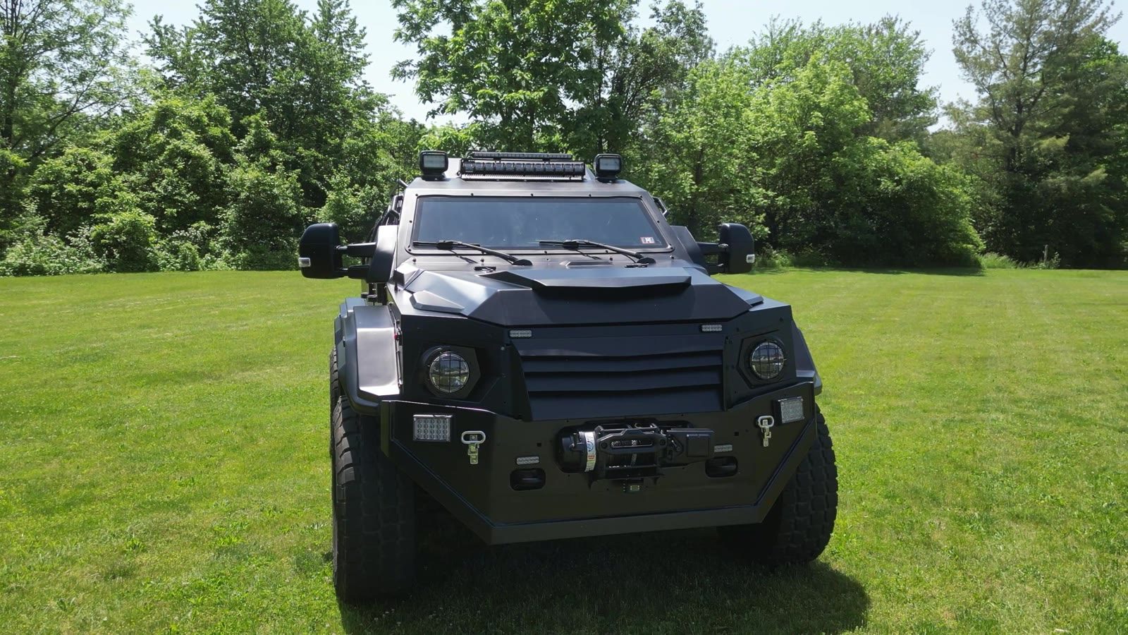Head-on front view with the roof light bar and bumper work