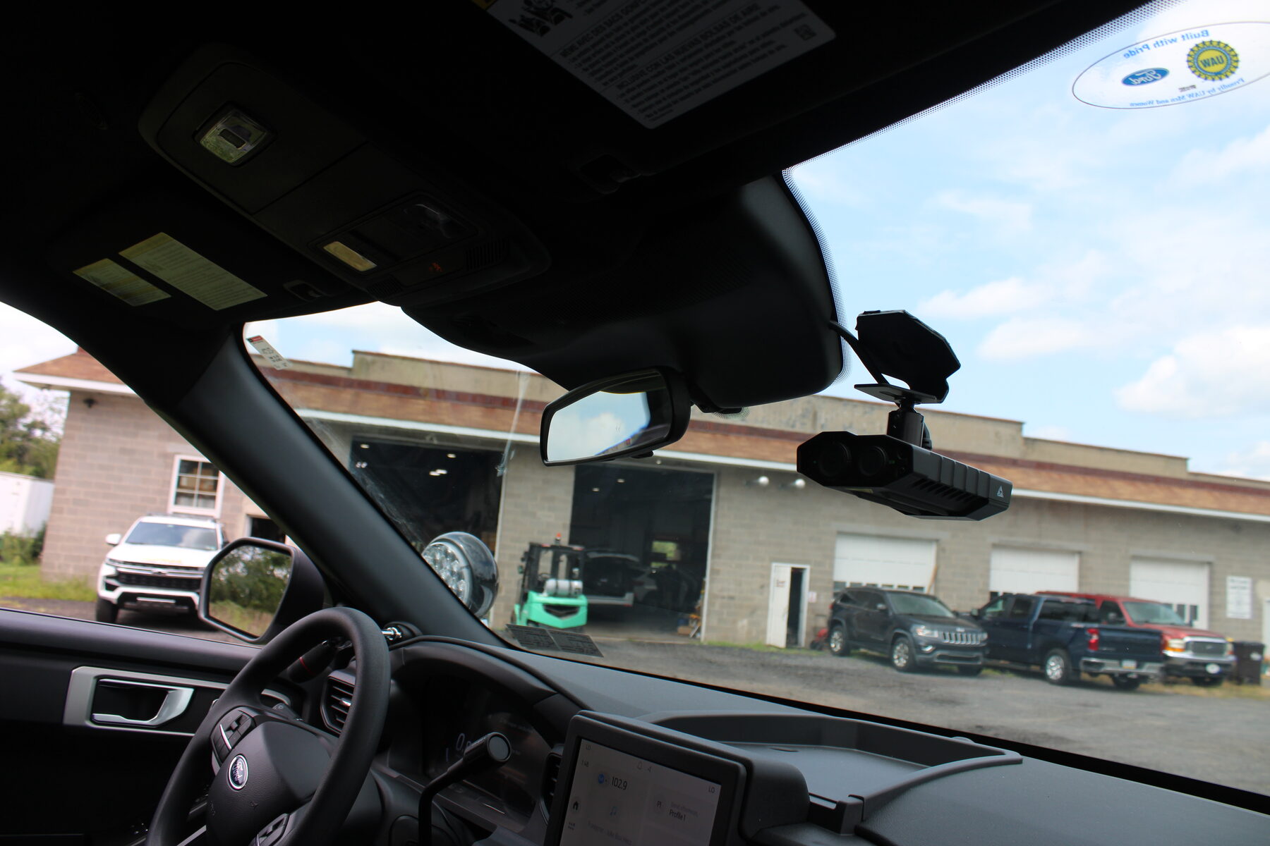 Windshield-mounted in-car camera