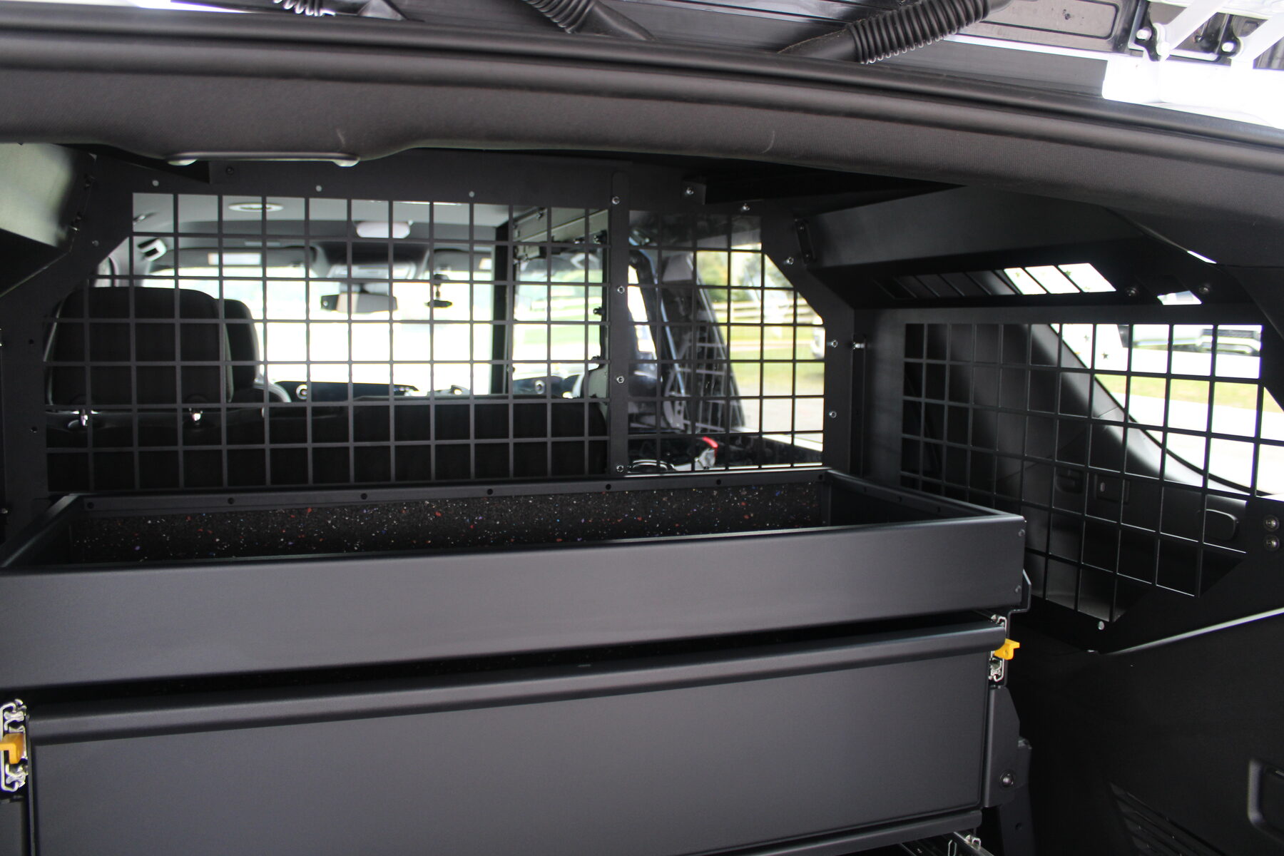 Cargo drawer and rear barrier